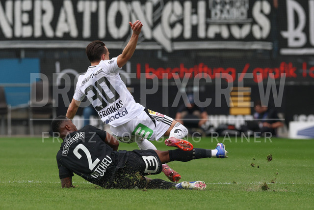 SK Puntigamer Sturm Graz vs TSV Egger Glas Hartberg – Championship Group    | Graz, Austria, 12.Apr.26 - SOCCER - ADMIRAL Bundesliga, SK Puntigamer Sturm Graz vs TSV Egger Glas Hartberg. The image shows Jeyland Mitchell (STU) and Lukas Fridrikas (Hartberg).    