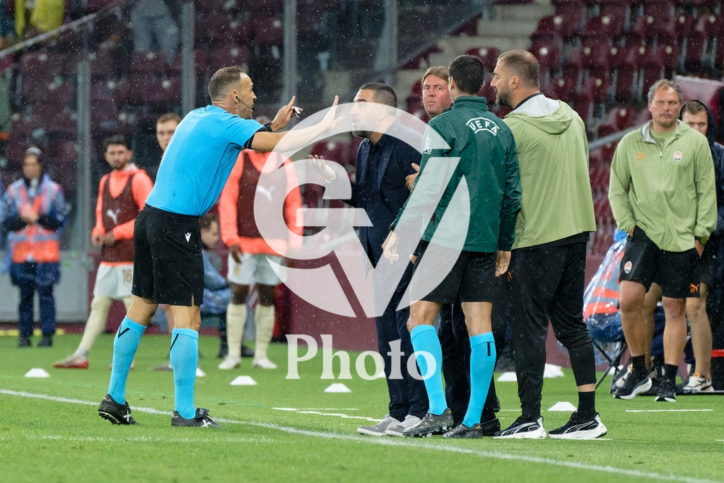 UEFA Conference League Play-offs 2nd leg - Servette FC v FC Shakhtar Donetsk | Guillermo Cuadra Fernandez referee speaks with Arda Turan (Coach FC Shakhtar Donetsk) during the UEFA Conference League Play-offs 2nd leg match between Servette FC and FC Shakhtar Donetsk at Stade de Geneve in Geneva, Switzerland