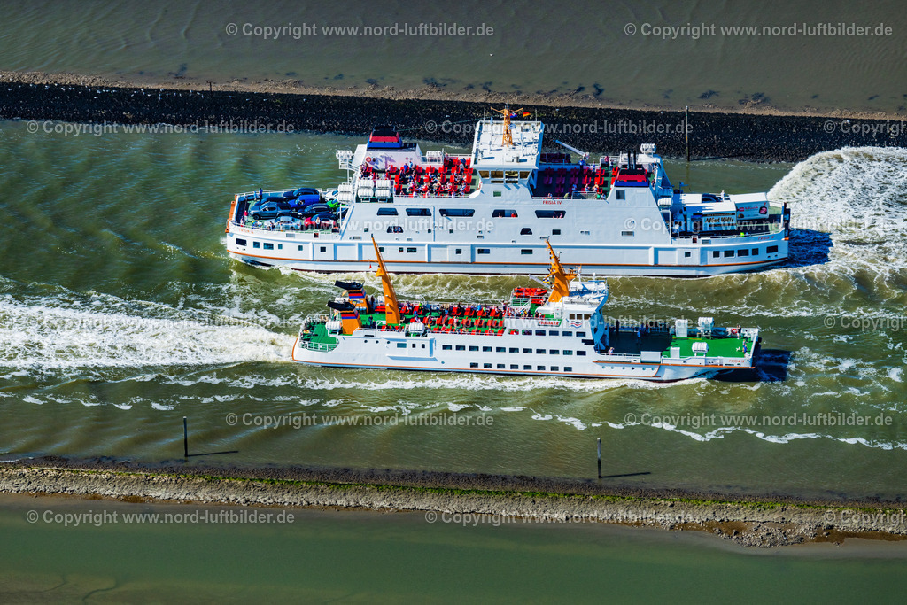 Norddeich_Fähren_Frisia_Iv_Inselfracht_ELS_7414050923 | NORDEN 05.09.2023 Fahrt eines Fähr- Schiffes der AG Reederei Norden-Frisia Schiff " Frisia 4 " und der Lastfähre " Inselfracht " in Norden Norddeich im Bundesland Niedersachsen, Deutschland. Weiterführende Informationen bei: Reederei Norden-Frisia AG. // Journey of a ferry ship of the AG Reederei Norden-Frisia ship "Frisia 4" and the cargo ferry "Inselfreight" in Norden Norddeich in the state Lower Saxony, Germany. Further information at: Reederei Norden-Frisia AG. Foto: Martin Elsen