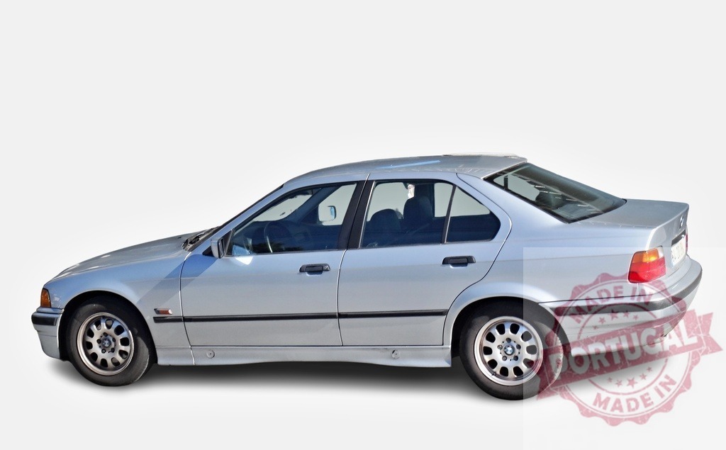 Silver BMW 3 Series E36 sedan car parked on white background | Side view of a silver BMW 3 Series E36 sedan car parked on a white background, showcasing its classic design - Realized with Pictrs.com
