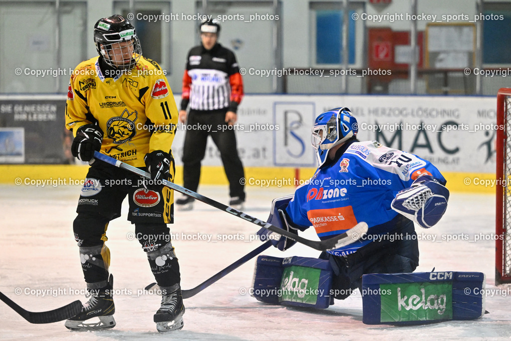 ESC SPARKASSE STEINDORF vs. MET PHOTOVOLTAIK HORNETS SPITTAL | #11 Kucher Florian EC Hornets Spittal, #70 Moser Lukas ESC Steindorf, ESC SPARKASSE STEINDORF vs. MET PHOTOVOLTAIK HORNETS SPITTAL, ESC SPARKASSE STEINDORF vs. MET PHOTOVOLTAIK HORNETS SPITTAL am 22.11.2025 in Steindorf (Ossiachersee Halle), Austria, (Photo by Bernd Stefan)
