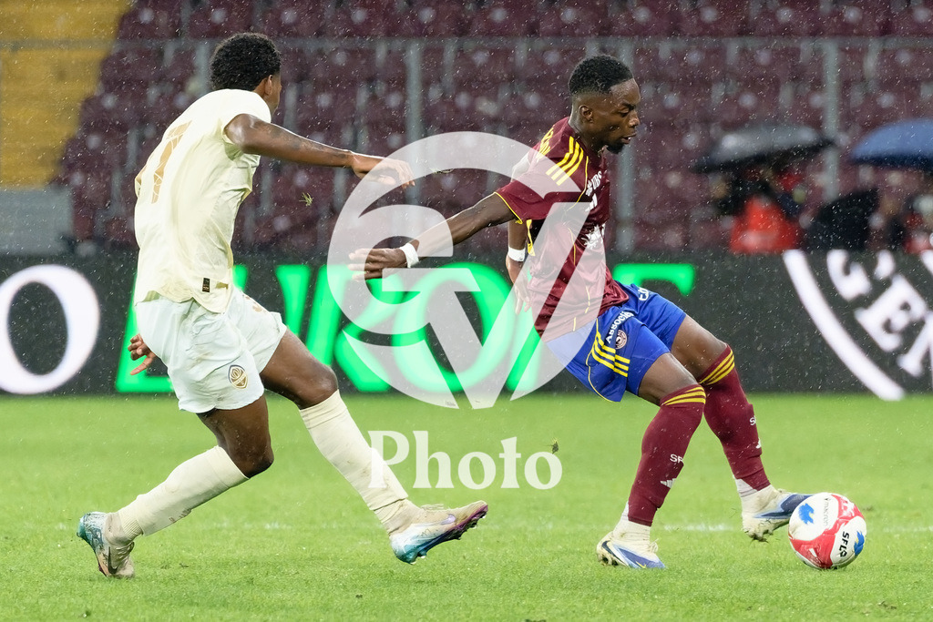 UEFA Conference League Play-offs 2nd leg - Servette FC v FC Shakhtar Donetsk | Bradley Mazikou (18 Servette FC) and Lucas Ferreira (37 FC Shakhtar Donetsk) battle for the ball (duel)  during the UEFA Conference League Play-offs 2nd leg match between Servette FC and FC Shakhtar Donetsk at Stade de Geneve in Geneva, Switzerland