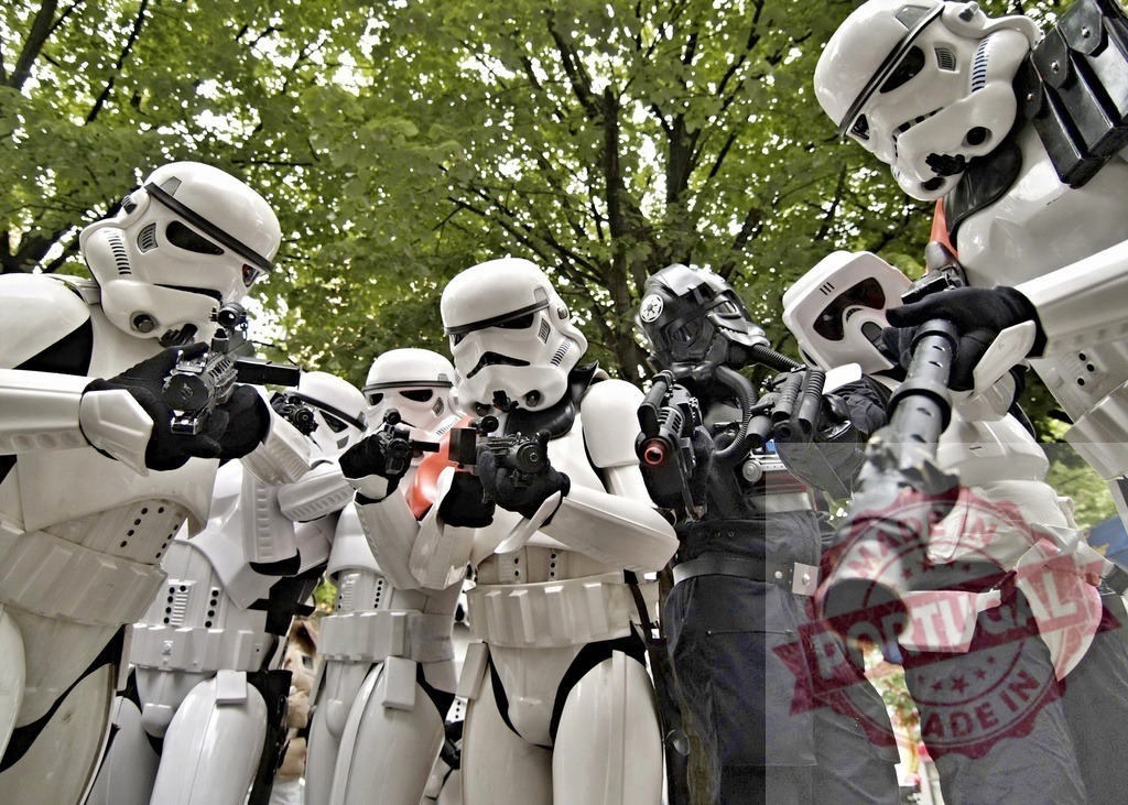Star Wars stormtroopers holding weapons are posing outdoors | Cosplayers dressed as Star Wars stormtroopers and Galactic Empire soldiers are posing outdoors with weapons - Realized with Pictrs.com