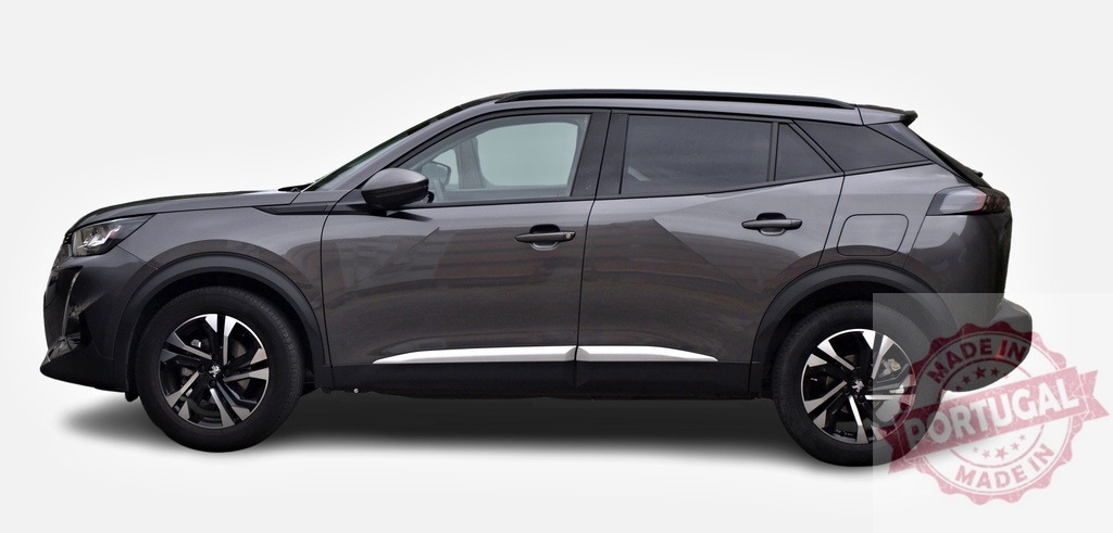 Modern dark gray Peugeot 2008 SUV car parked on white background, side view | Studio shot of a brand new Peugeot 2008 SUV car, dark gray crossover vehicle, isolated on white background - Realized with Pictrs.com