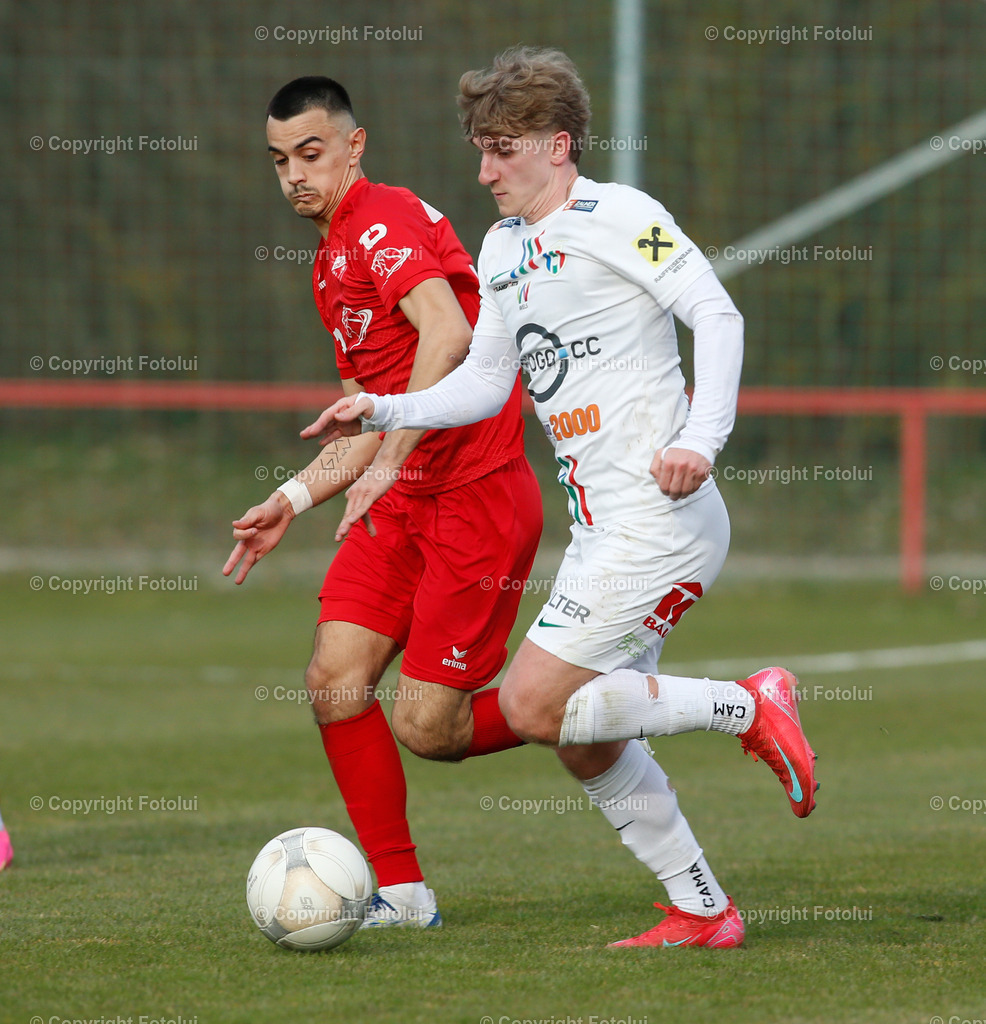 A_LUI_22032025_17 | SPORT,FUSSBALL,REGIONALLIGA MITTE ASKOE OEDT-HERTHA WELS 22.03.2025 IM BILD: FILIP BRESKIC (OEDT) UND ALEXANDER MAYER (WELS) FOTO:FOTOLUI