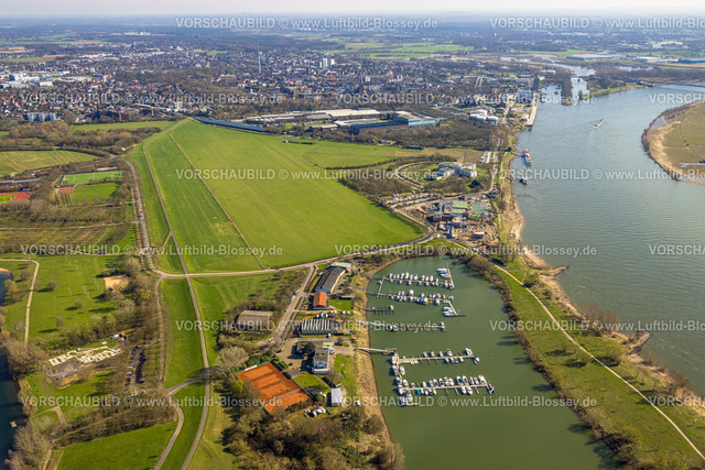 Wesel240311139 | Luftbild, Flugplatz Wesel-Römerwardt, Sporthafen und Yachthafen, Tennisplätze RTGW Wesel Tennis, Welcome Hotel Wesel Gastronomie, Allwetterbad Rheinbad Baustelle 
Kombibad, Wiesenfläche, Feldmark, Wesel, Nordrhein-Westfalen, Deutschland