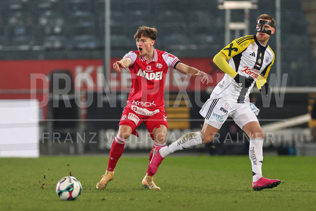 Austrian Bundesliga: Grazer AK 1902 vs LASK | GRAZ, AUSTRIA, 13.DEC.25 - SOCCER - ADMIRAL Bundesliga, Grazer AK 1902 vs LASK. The image shows Thomas Schiestl (GAK) and Kasper Jorgensen (Lask).