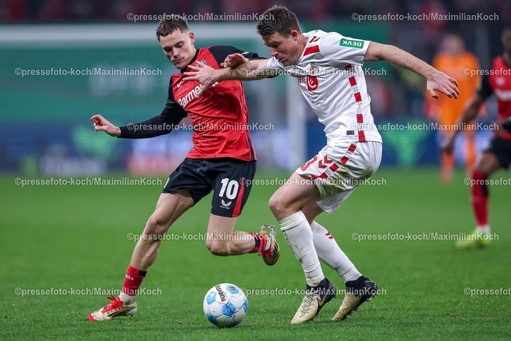 DFB05022502249 | 05.02.2025, Fußball, DFB-Pokal Viertelfinale, Bayer 04 Leverkusen - 1.FC Köln, BayArena, Saison 2024 2025: Florian Wirtz (Bayer04 Leverkusen #10) im Zweikampf gegen Dominique Heintz (FC Köln #3)DFB regulations prohibit any use of photographs as image sequences and or quasi-video.