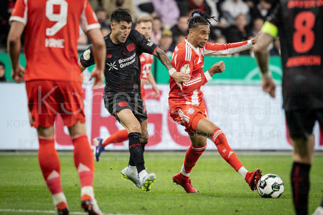 DFB Cup semifinal match Bayer 04 Leverkusen vs. FC Bayern Munich, 22.04.2026 | LEVERKUSEN, GERMANY - APRIL 22, 2026: Exequiel Palacios (Bayer 04 Leverkusen, 25), Michael Olise (FC Bayern Muenchen, 17) during the German DFB Cup semifinal match between Bayer 04 Leverkusen vs. FC Bayern Munich at BayArena on April 22, 2026 in Leverkusen, Germany. DFL REGULATIONS PROHIBIT ANY USE OF PHOTOGRAPHS AS IMAGE SEQUENCES AND/OR QUASI-VIDEO.
