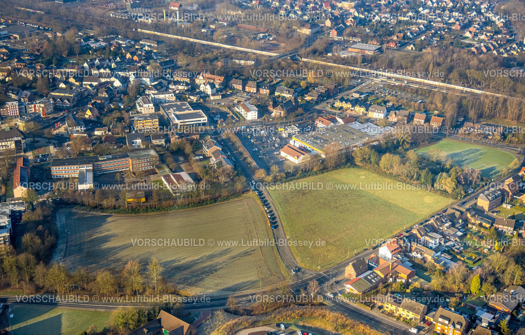 Hamm250200857Heessen | Luftbild, geplante potenzielle Baugebiete zwischen der Vogelstraße, Ennigerweg und Ahlener Straße, Einkaufszentrum mit Rewe und Aldi Supermarkt, Autos parken am Straßenrand, Stadtbezirk Heessen, Hamm, Ruhrgebiet, Nordrhein-Westfalen, Deutschland