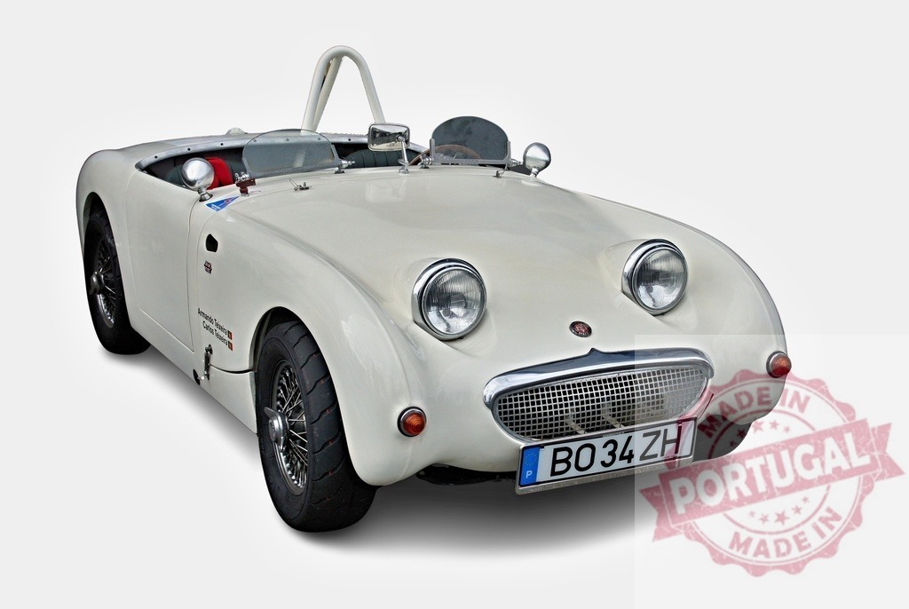 White Austin-Healey Sprite, vintage english sports car, parked on white background | Classic white Austin-Healey Sprite, also known as Frogeye, posing on a white background - Realized with Pictrs.com