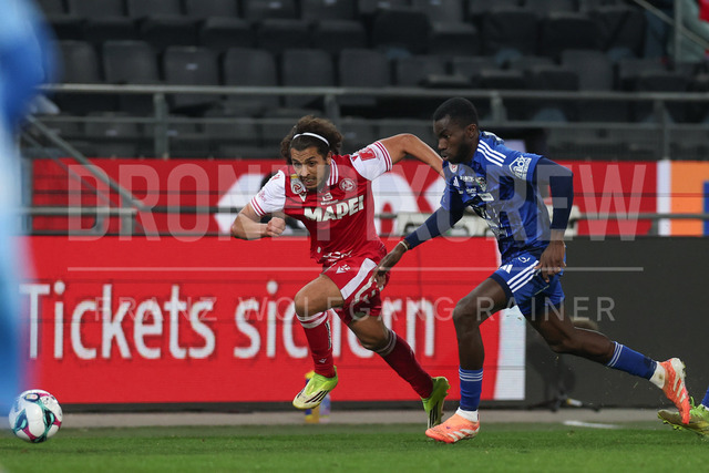 Grazer AK 1902 vs RZ Pellets WAC – Austrian Bundesliga | Graz, Austria, 14.Mar.26 - SOCCER - ADMIRAL Bundesliga, Grazer AK 1902 vs RZ Pellets WAC. The image shows Ramiz Harakate (GAK) and Cheick Mamadou Diabate (WAC).     