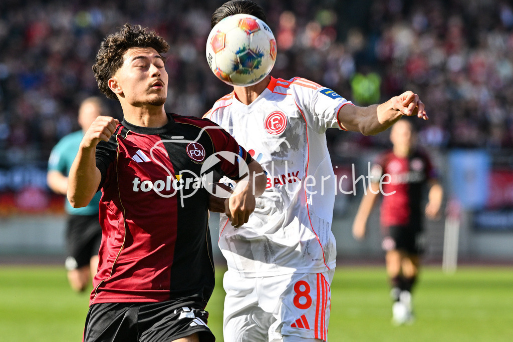 1. FC Nürnberg - Fortuna Düsseldorf | NUREMBERG, GERMANY - 07. MARCH:  im Duel Justin von der HITZ (1. FC Nuernberg 27) und Anouar EL AZZOUZI (Fortuna Düsseldorf 8) / während dem Match zwischen dem 1. FC Nürnberg und Fortuna Düsseldorf am 25. Spieltag der 2. Bundesliga im Max Morlock Stadion / DFL REGULATIONS PROHIBIT ANY USE OF PHOTOGRAPHS AS IMAGE SEQUENCES AND/OR QUASI-VIDEO