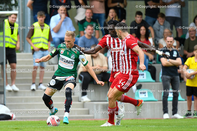 AUT, SV Ried (AUT) vs Olympiakos FC (GRE), Testspiel, Vorbereitung 2022-23 | 24.06.2022, Guntamatic  Arena Peuerbach, AUT, Testspiel Vorbereitung 2022-23, SV Ried (AUT) vs Olympiakos FC (GRE),  im Bild Christoph Monschein (Ried) vs Ousseynou Ba (Olympiacos FC), Kostas Manolas (Olympiacos FC)

// Test Match, New Season 2022-23 SV Ried (AUT) vs Olympiakos FC (GRE) in Peuerbach, Austria on 2022/06/24
