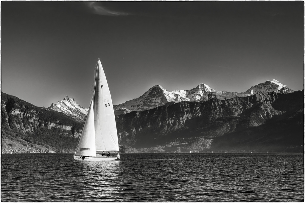White Peaks | Ein klassisches Segelboot ( 45er Nationale Kreuzer,  Baujahr 1922) auf dem Thunersee vor den Berner Alpen - Schreckhorn, Eiger, Mönch und Jungfrau. 
------------------------------------------------------------
A classic sailing boat (45 national cruiser, built in 1922) on Lake Thun in front of the Bernese Alps - Schreckhorn, Eiger, Mönch and Jungfrau.
------------------------------------------------------------
Dieser Druck ist in einer limitierten Auflage von 5 Exemplaren erhältlich. 
This print is available in a limited edition of 5 copies. 
http://art.hess.photography/99-white-peaks.html - Realisiert mit Pictrs.com
