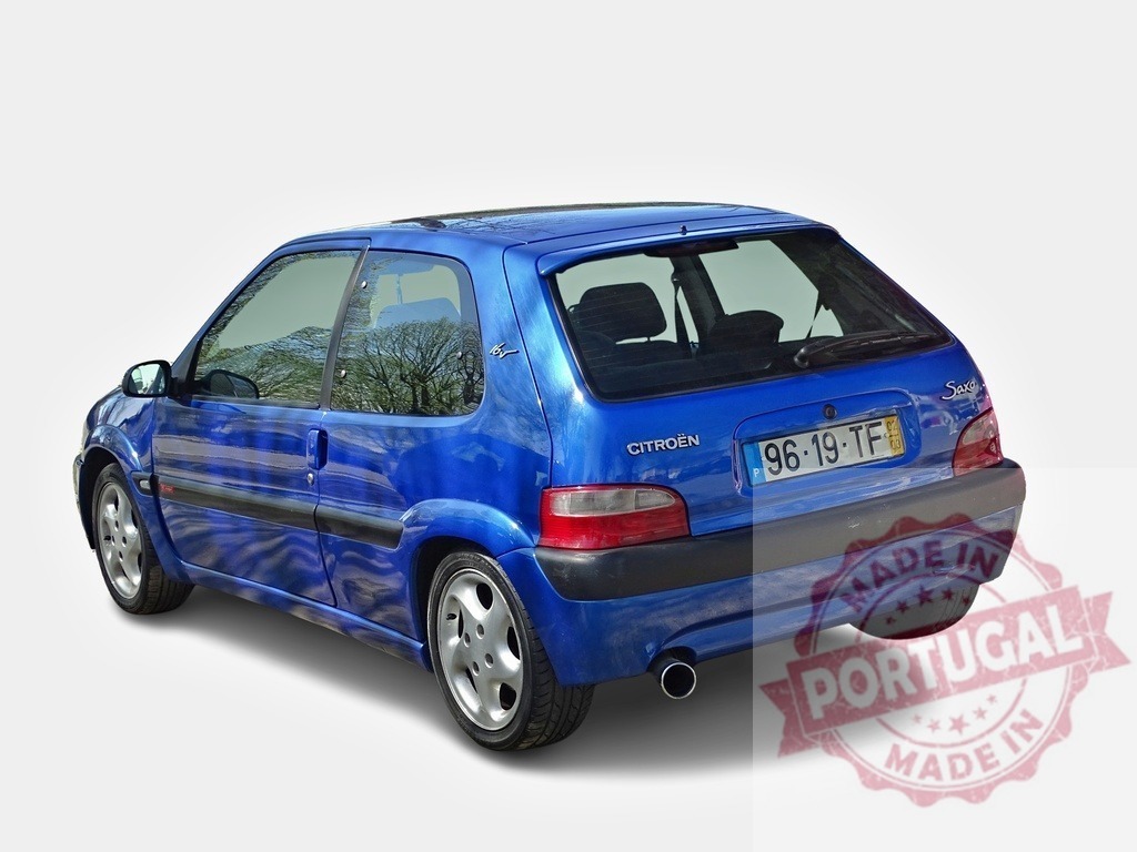 Blue Citroën Saxo Hatchback Parked on White Background | Compact blue Citroën Saxo car displayed against a clean white backdrop - Realized with Pictrs.com