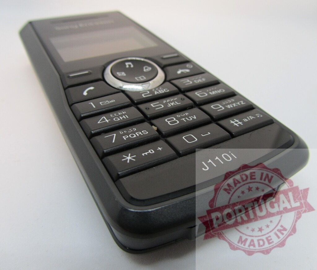 Sony Ericsson J110i mobile phone showing keypad and navigation buttons | Close-up of a classic Sony Ericsson J110i mobile phone, highlighting its keypad and navigation buttons - Realized with Pictrs.com