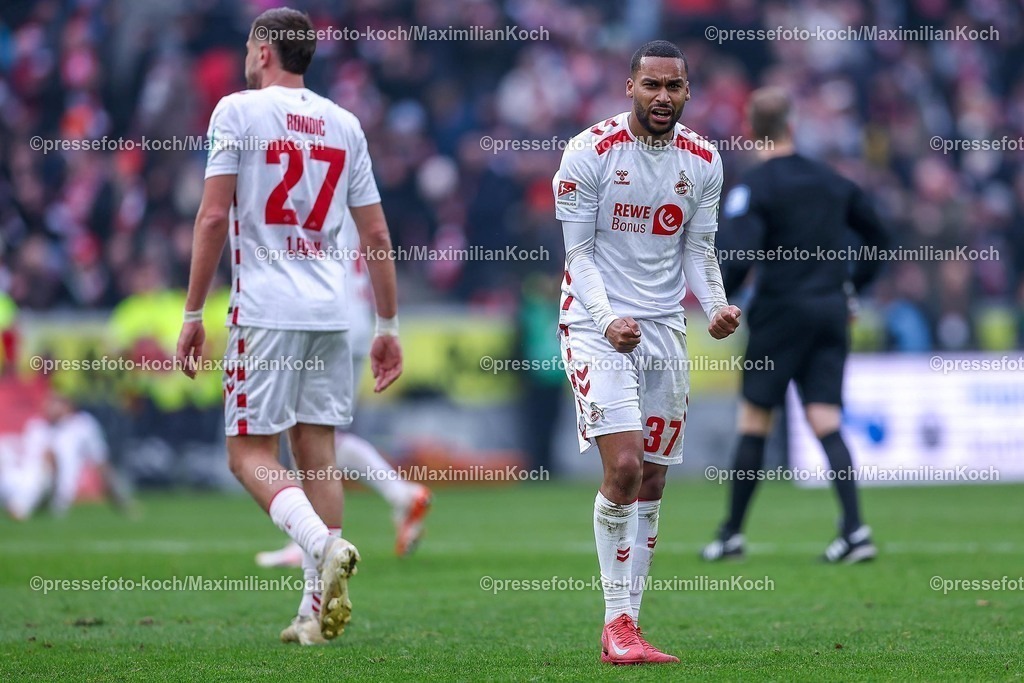 1FC09022501097 | 09.02.2025, Fußball, 1. FC Köln - FC Schalke 04, 2.. Fußball Bundesliga, 21. Spieltag, RheinEnergie-STADION, Saison 2024 2025: Linton Maina (FC Köln #37) jubelnd nach dem 1:0 Sieg neben Imad Rondic (FC Köln #27)DFB regulations prohibit any use of photographs as image sequences and or quasi-video.
