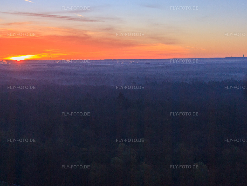 Luftbild: Sonnenaufgang über dem Bienwald in Wörth am Rhein im Bundesland Rheinland-Pfalz in Deutschland. Foto: IMG_62959.jpg vom 20.03.2014 durch Werner Riehm/FLY-FOTO.de