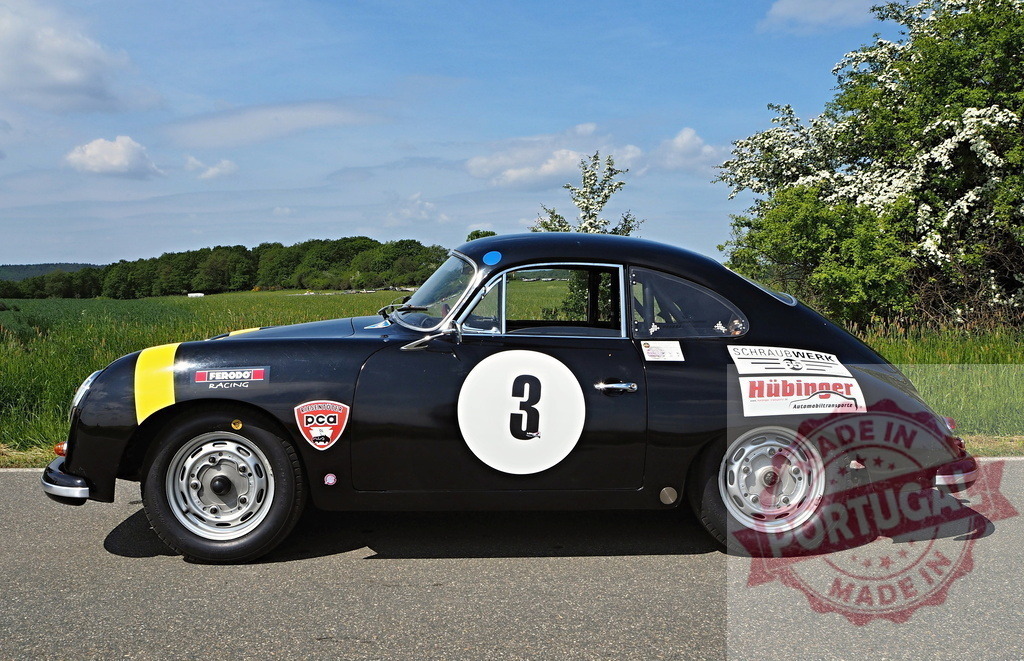 Porsche 356 classic race car driving on countryside road | Black Porsche 356 classic sports car parked on a scenic rural road - Realisiert mit Pictrs.com