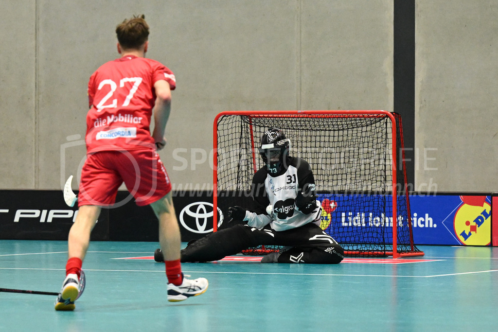 Switzerland B U19 vs Finland U19 - 2. February 2024 | Switzerland B U19 vs Finland U19
U19 Men International Matches in Switzerland
GoEasy Arena, Siggenthal Station
Finland goalkeeper #31 Veikko Rauhanen blocks the ball of Switzerland forward #27 Levin Peter.
Credit: Markus Aeschimann | <a href="https://www.markus-aeschimann.ch">Sportfotografie Markus Aeschimann</a> | <a href="https://www.instagram.com/sportfotografie.aeschimann">@sportfotografie.aeschimann</a> - Realisiert mit Pictrs.com
