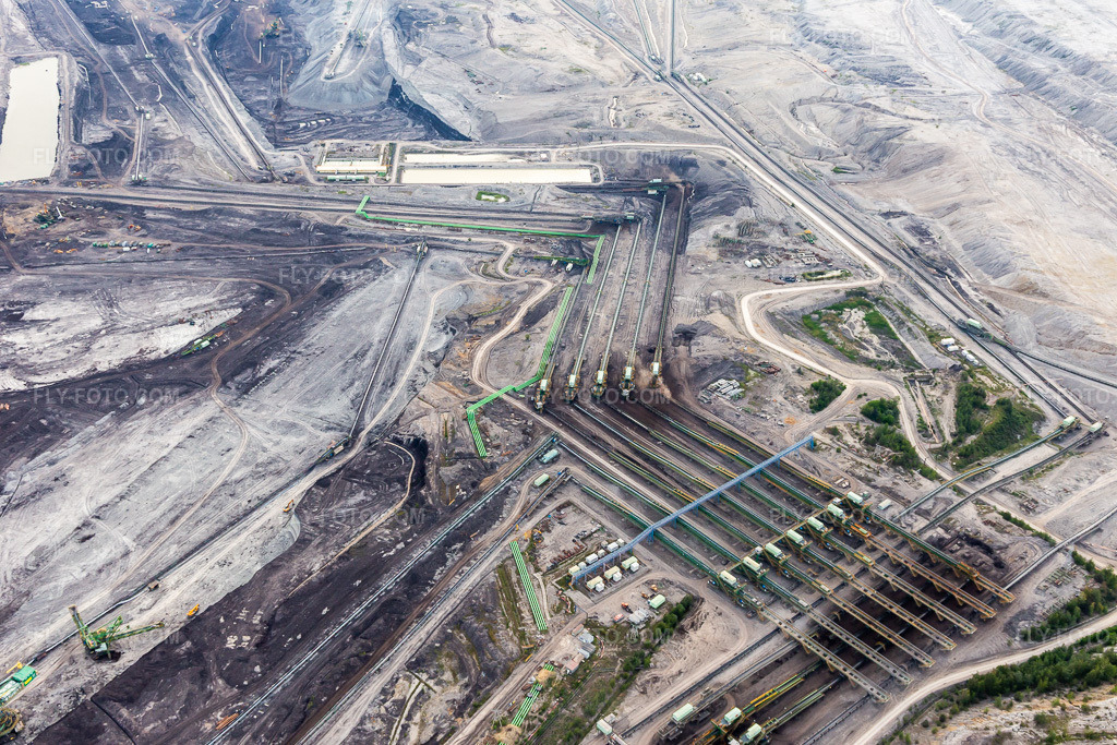 Aerial view: Conveyor belts in the opencast brown coal mine 
