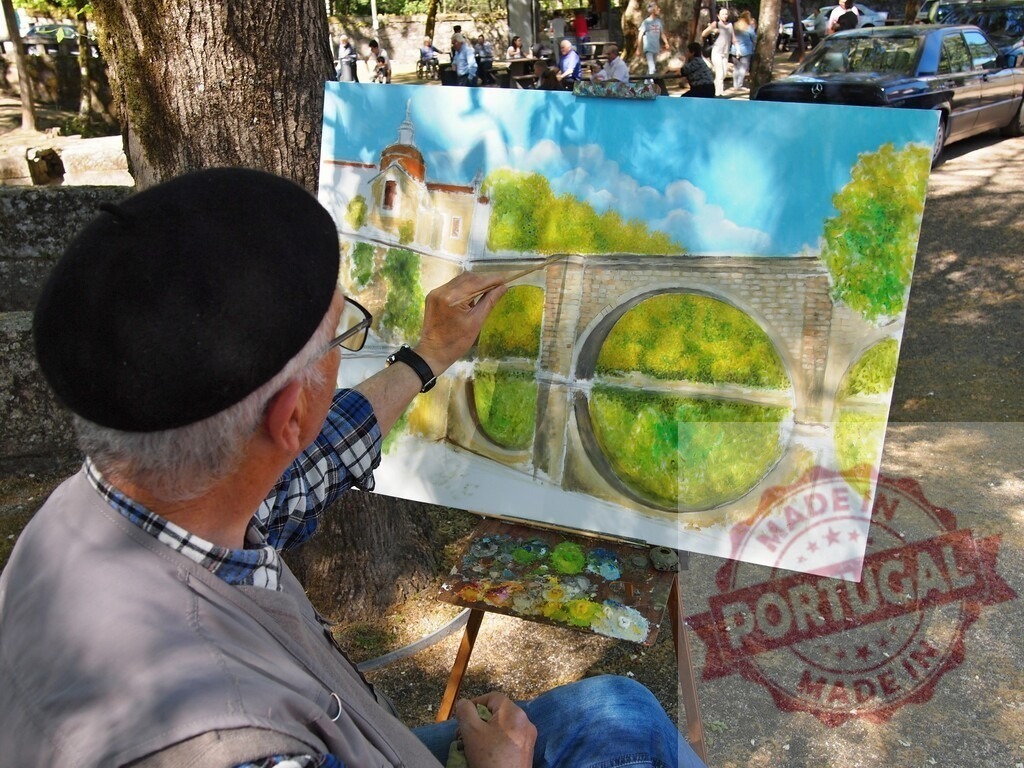 Artist painting landscape plein air in park | Senior artist creating an outdoor painting on canvas with brush and easel - Realisiert mit Pictrs.com