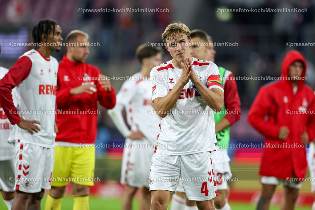 Koe14092401062 | 14.09.2024, 2. Fußball Bundesliga, 1. FC Köln - 1. FC Magdeburg, RheinEnergieSTADION, Saison 2024 2025: Timo Hübers (1.FC Köln #4) bedankt sich enttäuscht nach der 1:2 Niederlage für den Support der FansDFB regulations prohibit any use of photographs as image sequences and or quasi-video.