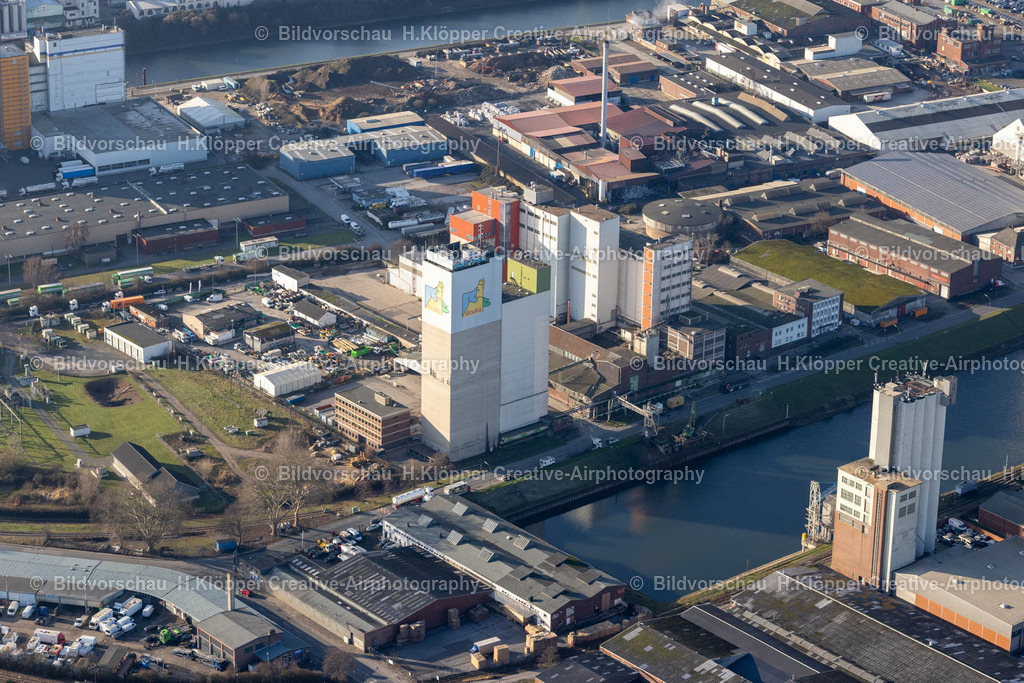 Luftbild Neuss-8920 | Luftbildfotografie Gebäude und Produktionshallen auf dem Fabrikgelände " Deutsche Tiernahrung Cremer GmbH &amp; Co. KG " an der Danziger Straße in Neuss im Bundesland Nordrhein-Westfalen, Deutschland - Realized with Pictrs.com