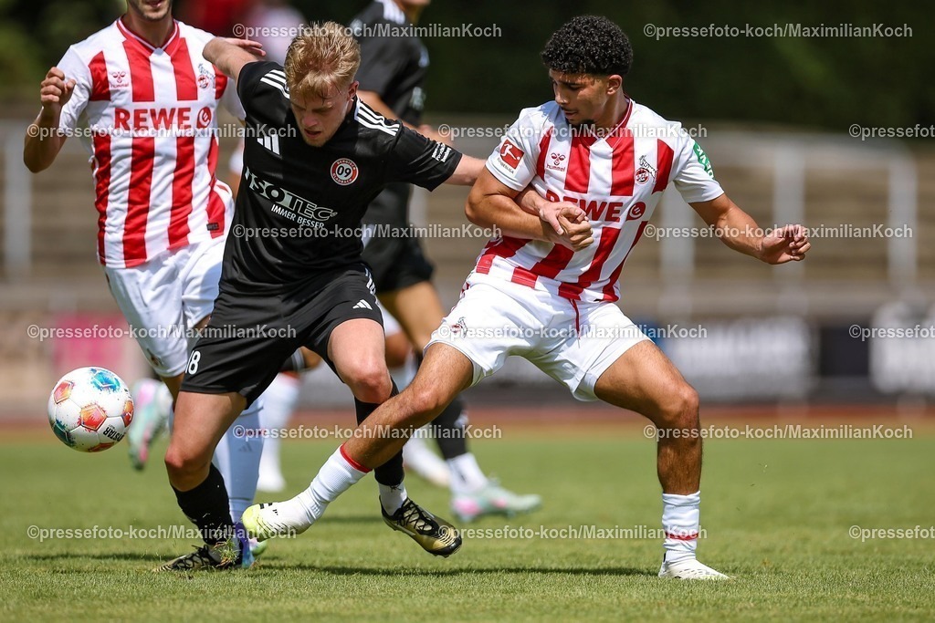 1FC12072501264 | 12.07.2025, Fußball, SV Bergisch Gladbach 09 - 1. FC Köln, Testspiel, BELKAW-Arena, Saison 2025 2026: Jan Tobias Ecke (Bergisch-Gladbach #18) im Zweikampf gegen Fayssal Harchaoui (1.FC Koeln #34) DFB regulations prohibit any use of photographs as image sequences and or quasi-video.