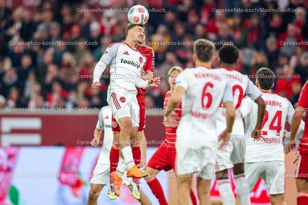 F9503102501135 | 03.10.2025, Fußball, Fortuna Düsseldorf - 1.FC Nürnberg, 2. Fußball Bundesliga, Merkur Spiel-Arena, Saison 2025 2026: Rafael Lubach (1FC Nuernberg #18) und Moritz Heyer (Fortuna Düsseldorf #05) stoßen im Strafraum beim Kopfball zusammen  DFB regulations prohibit any use of photographs as image sequences and or quasi-video.