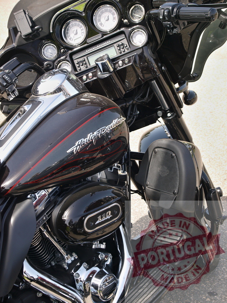 Harley-Davidson motorcycle touring dashboard engine detail | Harley-Davidson motorcycle showing front fairing, dashboard, fuel tank and chrome engine - Realized with Pictrs.com