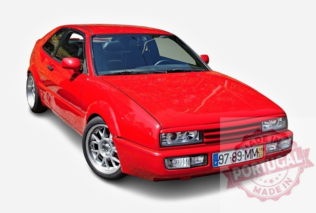 Red Volkswagen Corrado shining parked on white background | Tuned red Volkswagen Corrado is parked on a white background, showing its customized alloy wheels - Realized with Pictrs.com