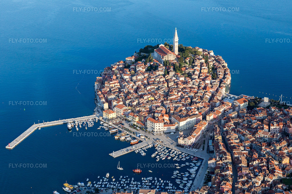 Aerial view: View of the town on the Mediterranean coast near the old town of Rovinj in Istarska Župania - Istria, Croatia. The prominent headland lies on the west coast of the Istrian peninsula. in Rovinj in the state Gespanschaft Istrien, Croatia.Photo: IMG_106271.jpg taken on 04/14/2018 by Werner Riehm/FLY-FOTO.comResolution of the original: 5472 x 3648 px