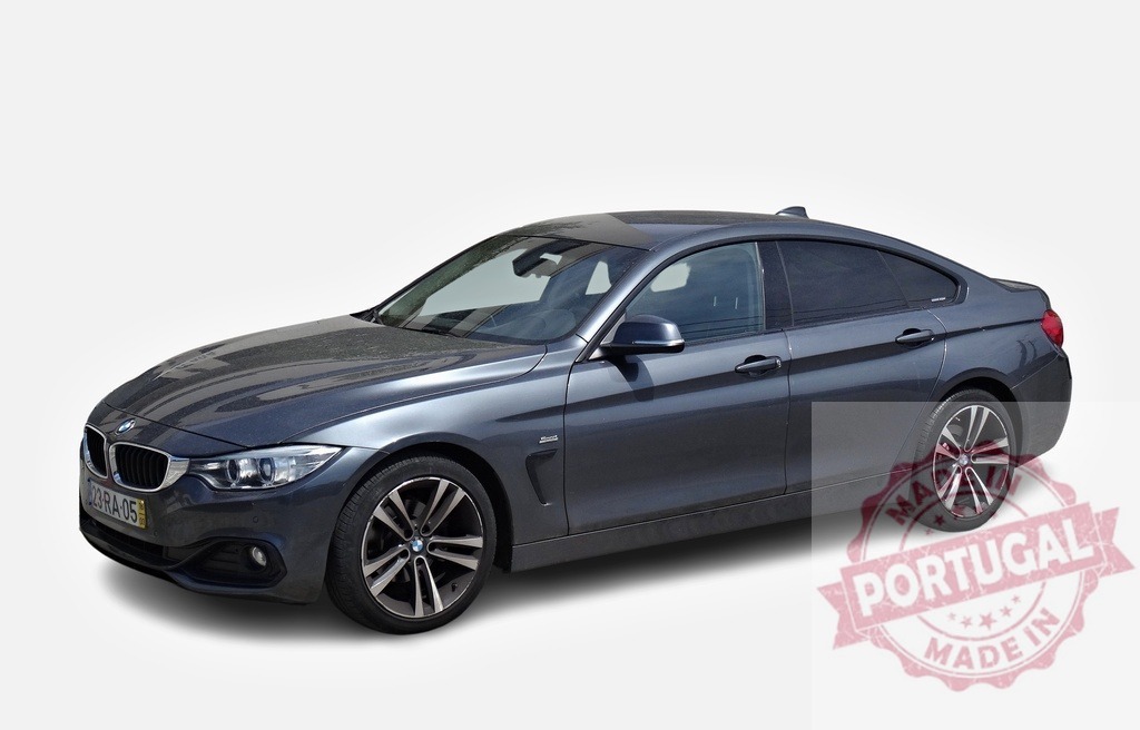 BMW 4 Series Gran Coupé posing in studio on white background | Modern luxury gray BMW 4 Series Gran Coupé posing in a studio setting, showcasing its sleek design and sporty features - Realisiert mit Pictrs.com
