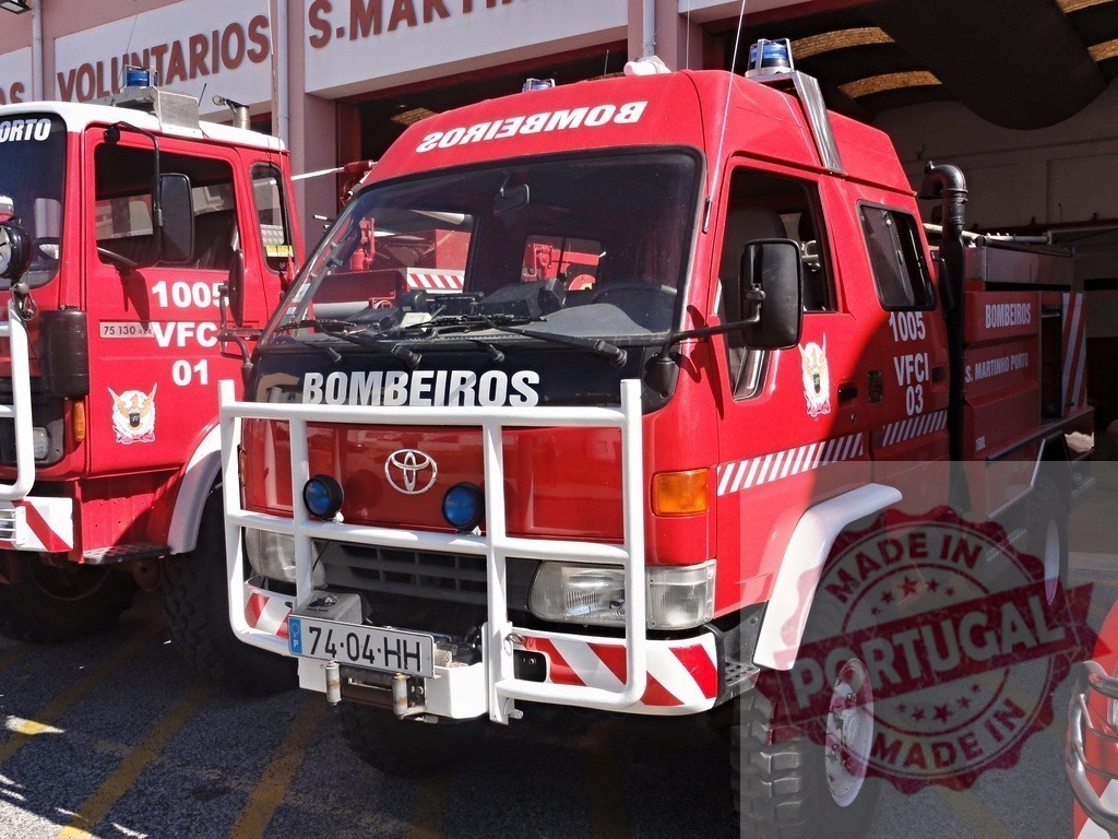 Bombeiros S.Martinho Porto fire truck in Portugal | Red Toyota fire engine parked outside a Bombeiros Voluntarios fire station - Realized with Pictrs.com