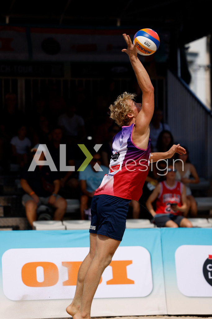 Obi BeachTour 2026 - Basel | BASEL, SWITZERLAND - JULY 18: JACOB HEJLSVIG PETERSEN (DEN) serve during the Obi BeachTour 2026 match between ALLEMANN / LEFFLER (SUI) and MASSEREY / SCHNEGG (SUI) at Barfüsserplatz on July 18, 2026 in Basel, Switzerland. - Realisiert mit Pictrs.com