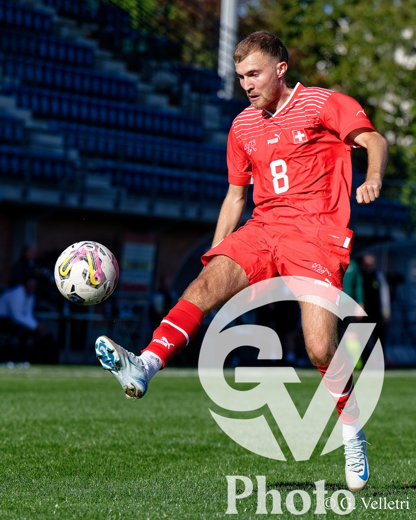 UEFA Region's Cup - NI Western Region v Vaud | Johannes Schwab (8 Vaud) controls the ball (action) during the UEFA Region's Cup game between NI Western Region and Vaud at Centre Sportif de Colovray in Nyon, Switzerland 