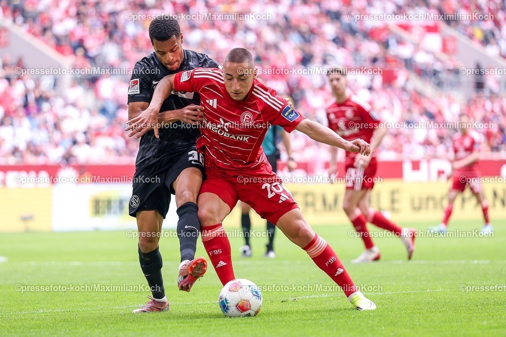 F9510052601024 | 10.05.2026, Fußball, Fortuna Düsseldorf - SV 07 Elversberg, 2. Fußball Bundesliga, Herren, Merkur Spiel-Arena, 33. Spieltag, Saison 2025 2026: Marin Ljubicic&nbsp;(Fortuna Düsseldorf #20) im Zweikampf gegen  Jan Gyamerah&nbsp;(Elversberg #30)  DFB regulations prohibit any use of photographs as image sequences and or quasi-video.