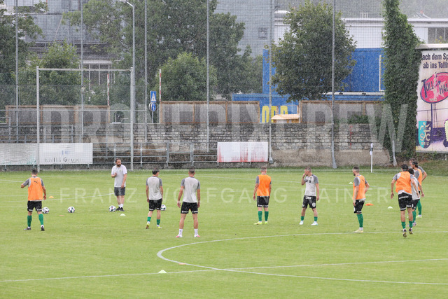 Friendly Match: SC Weiz vs TSV Hartberg in Weiz | Weiz, AUSTRIA, 01.JUL.26 - SOCCER - ADMIRAL Bundesliga, SC Weiz vs TSV Hartberg, test match. The image shows heavy rain during warm up from SC Weiz.