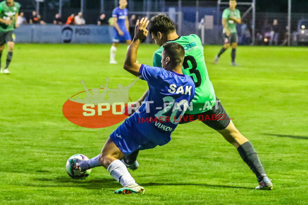 SAK Klagenfurt - VST Völkermarkt 4-5, Kärntner Liga 3. Runde | Luka Vukovic (SAK Klagenfurt #20) Marcel Hrowath (VST Völkermark #3) SAK Klagenfurt - VST Völkermarkt 4-5 am 11.08.2023 in Klagenfurt
(SAK Sportpark), Austria, (Photo by Ernst Krawagner sport-fan.at) - Realisiert mit Pictrs.com