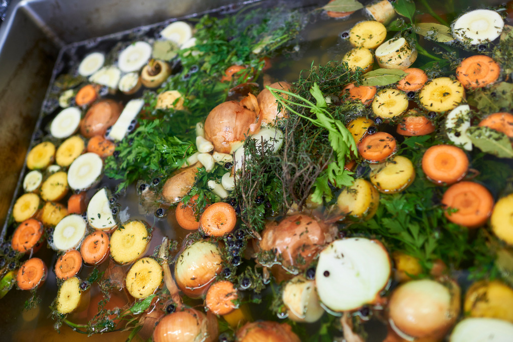 Gugumuck Wiener Schnecken Manufaktur | Wien, Austria - May 29, 2017: Gugumuck Wiener Schnecken Manufaktur;  Ansatz von Gemüsesud. - Realisiert mit Pictrs.com