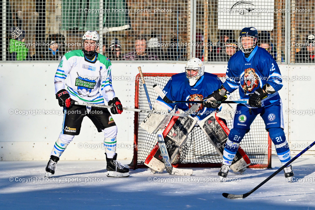 EC Tigers Paternion vs. EC FELD AM SEE/DSG LEDENITZEN | #98 Tschuitz Dominik EC FELD AM SEE Ledenitzen, #21 Lesacher Jürgen EC Tigers Paternion, #12 Steiner Domenik EC Tigers Paternion, EC Tigers Paternion vs. EC FELD AM SEE/DSG LEDENITZEN, EC Tigers Paternion vs. EC FELD AM SEE/DSG LEDENITZEN am 04.01.2026 in Paternion (Eislaufplatz Paternion), Austria, (Photo by Bernd Stefan)