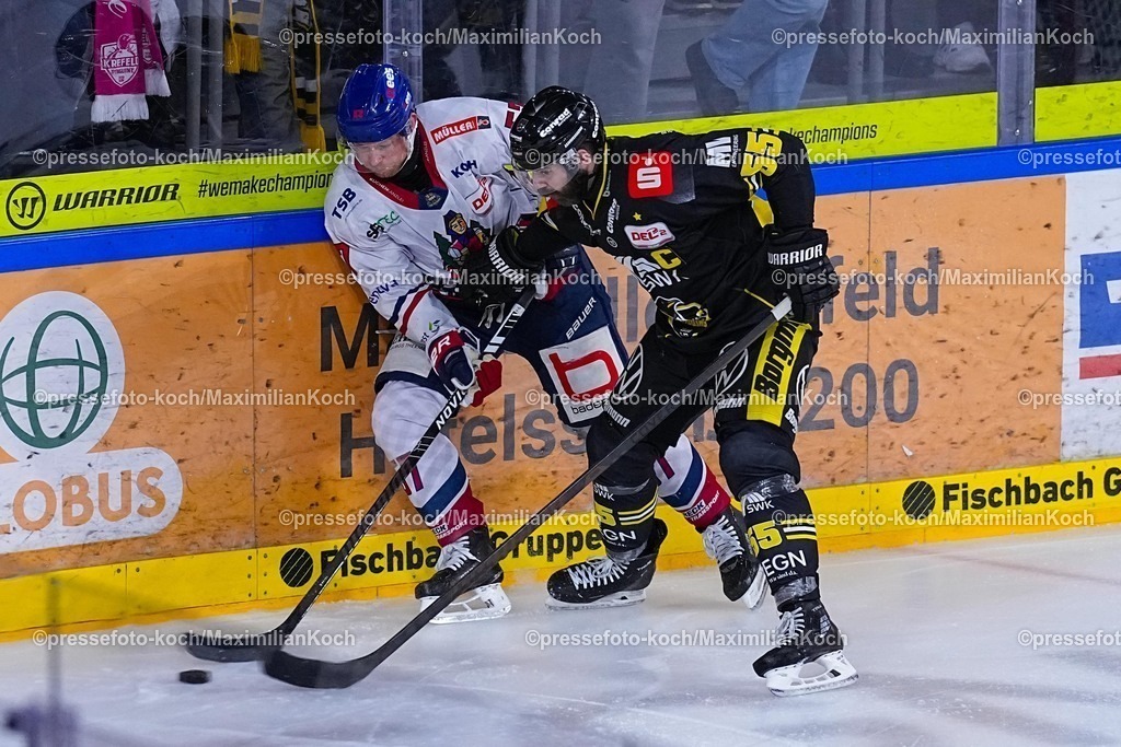 xYDRx16012601019 | 16.01.2026, xydrx, Eishockey, DEL2, Krefeld Pinguine - EHC Freiburg, Yayla-Arena Krefeld : Christian Kretschmann (EHC Freiburg #57) im Zweikampf gegen Davis Vandane (Krefeld Pinguine #55)Photo: xYannisxDreimannxPressefotoKochx