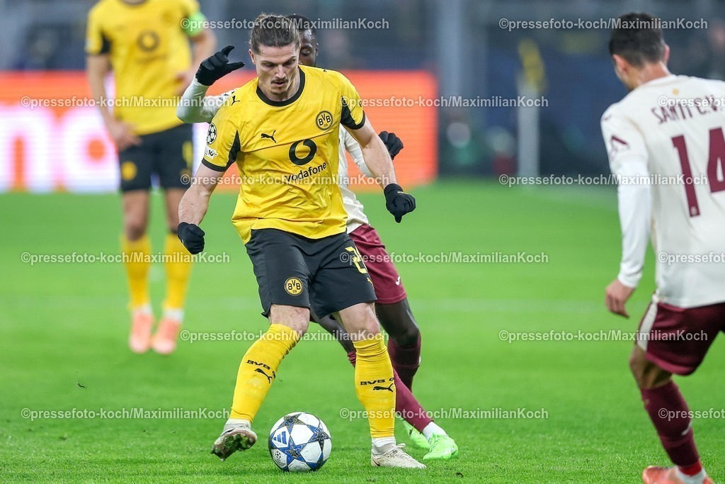 UCL25112501053 | 25.11.2025, Fußball, UEFA Champions League, Borussia Dortmund - FC Villarreal, BVB Stadion, 5. Spieltag, Saison 2025 2026: Nicolas Pepe&nbsp;(FC Villarreal #19) im Zweikampf gegen  Marcel Sabitzer&nbsp;(BVB #20)  Regulations prohibit any use of photographs as image sequences and or quasi-video.