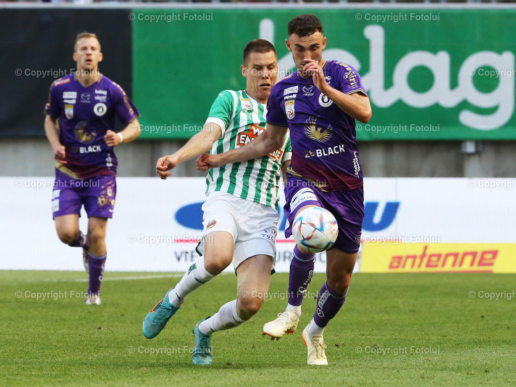 A_LUI_03062023_16 | SPORT,FUSSBALL,ADMIRAL BUNDESLIGA AUSTRIA KLAGENFURT-SK RAPID WIEN 03.06.2023 IM BILD: ANDREW IRVING (KLAGENFURT) UND ALEKSA PEJIC (RAPID) FOTOLUI/MW

