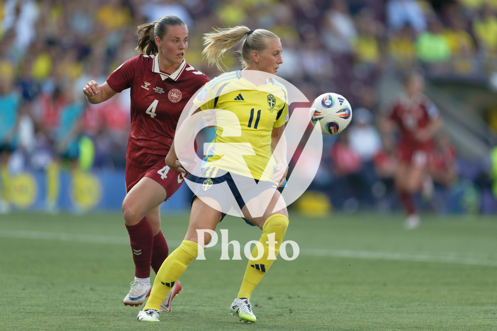 Denmark v Sweden - UEFA Women's EURO 2025 Group C | GENEVA, SWITZERLAND - JULY 4: Stina Blackstenius of Sweden (R) under pressure from  Emma Faerge of Denmark (L)  during the UEFA Womens EURO 2025 Group C match between Denmark and Sweden at Stade de Geneve on July 4, 2025 in Geneva, Switzerland. (Photo by Giuseppe Velletri/Sports Press Photo/Getty Images)