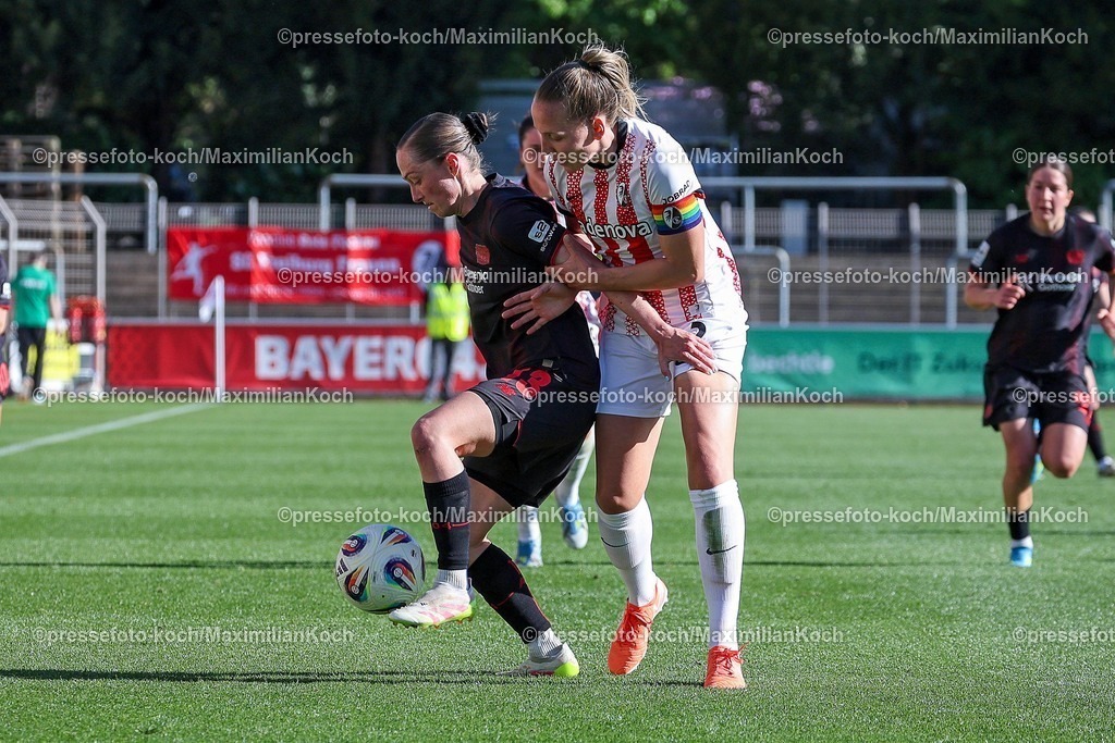 xsscx26042601032 | 26.04.2026, xsscx, Frauen Fussball, Bayer 04 Leverkusen - SC Freiburg, 1. Fussball Bundesliga, 23. Spieltag, Ulrich-Haberland-Stadion, Saison 2025 2026: Vanessa Haim (Bayer Leverkusen #13) im Zweikampf gegen Lisa Karl (SC Freiburg #02) DFB regulations prohibit any use of photographs as image sequences and or quasi-video. Photo: xSandraxScherningxPressefotoKochx
