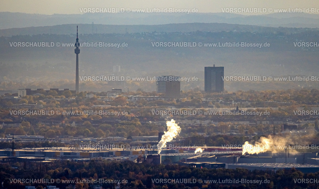 Dortmund231102059 | Luftbild, Skyline von Dortmund mit dunstiger Fernsicht und Rauchwolken, Blick vom Gewerbegebiet Westfalenhütte, Florianturm Aussichtsturm und Fernsehturm Wahrzeichen im Westfalenpark, Hochhäuser Firmensitz Westnetz und Bürotower Florian 11, umgeben von Herbstwald und herbstlichen Laubbäumen, Ruhrallee, Dortmund, Ruhrgebiet, Nordrhein-Westfalen, Deutschland