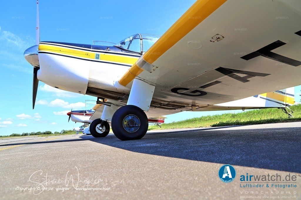 Jodel DR1050M - Flugplatz Husum - The aircraft is constructed primarily from wood | The aircraft is constructed primarily from wood, with its flying surfaces covered in doped aircraft fabric. The wing has a span of 8.72 m (28.6 ft), uses a NACA 23012 airfoil, and has a surface area of 13.60 m² (146.4 sq ft). The DR1050M Excellence features a swept fin, a one-piece all-moving tailplane, and an improved canopy compared to earlier variants. It is equipped with a fixed conventional landing gear, though tricycle landing gear is optional on homebuilt versions.